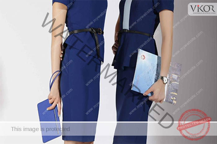 Đồng phục ngân hàng Quân Đội với màu xanh đặc trưng kết hợp cùng thắt lưng màu đen bản nhỏ Đồng phục ngân hàng Quân Đội với màu xanh đặc trưng kết hợp cùng thắt lưng màu đen bản nhỏ